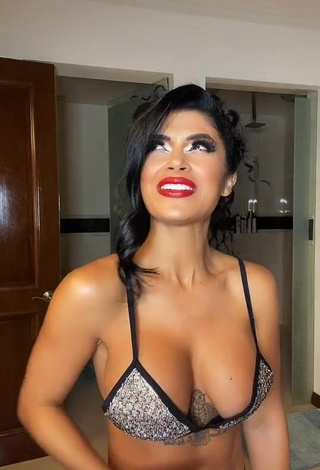 3. Sexy Kimberly Flores Shows Cleavage in Silver Bikini Top