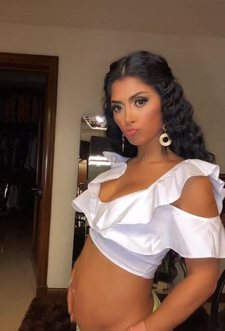 1. Elegant Kimberly Flores in White Crop Top