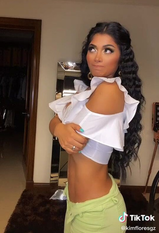 3. Elegant Kimberly Flores in White Crop Top