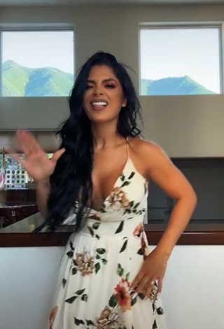 3. Cute Kimberly Flores Shows Cleavage in Floral Dress