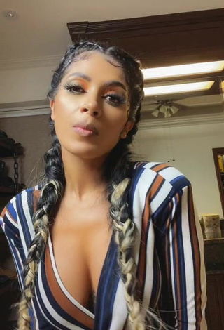 1. Erotic Kimberly Flores Shows Cleavage in Striped Overall