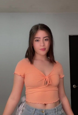 Erotic Kim Muñoz in Peach Crop Top