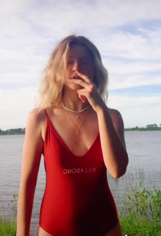 Captivating Katerine Krause in Red Swimsuit at the Beach