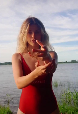 3. Captivating Katerine Krause in Red Swimsuit at the Beach