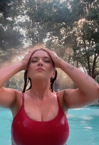 3. Erotic Kristin Arteaga Shows Cleavage in Red Swimsuit at the Swimming Pool