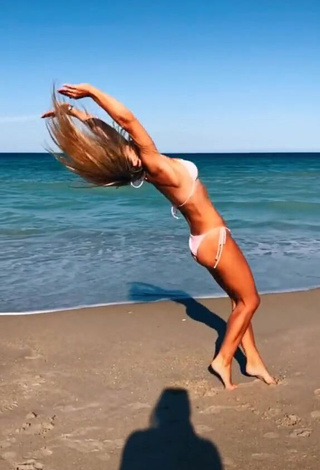 Hottest Olivia Dunne in White Bikini at the Beach while doing Fitness Exercises