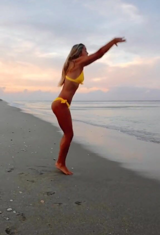 Erotic Olivia Dunne in Yellow Bikini at the Beach while doing Fitness Exercises