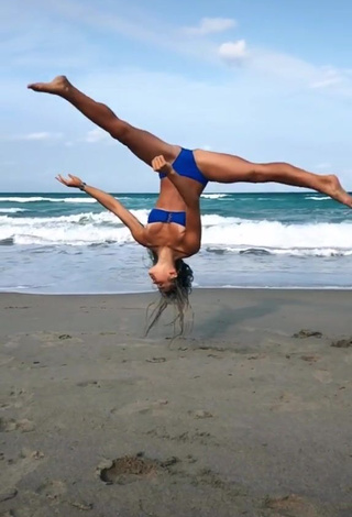 3. Hottie Olivia Dunne in Blue Bikini at the Beach while doing Fitness Exercises