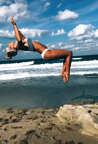 3. Irresistible Olivia Dunne in White Bikini at the Beach