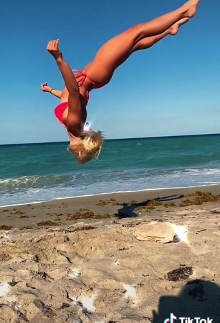 3. Sweetie Olivia Dunne in Red Bikini at the Beach while doing Fitness Exercises