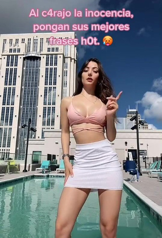 Irresistible Andrea Caro Shows Cleavage in Pink Crop Top at the Swimming Pool