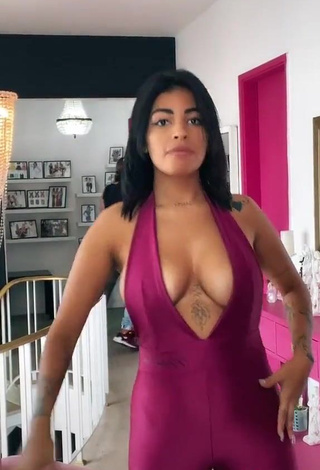 3. Erotic MC Lya Shows Cleavage in Violet Overall and Bouncing Tits