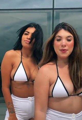 1. Captivating MC Lya Shows Cleavage in White Bikini Top