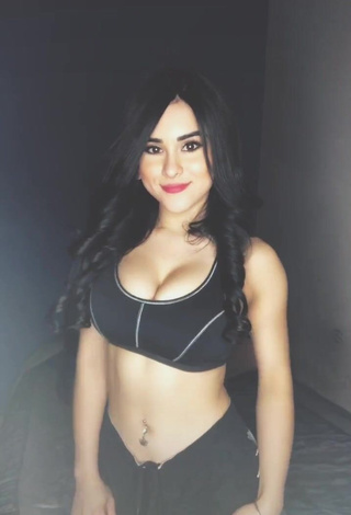 1. Irresistible Ónice Flores Shows Cleavage in Black Sport Bra