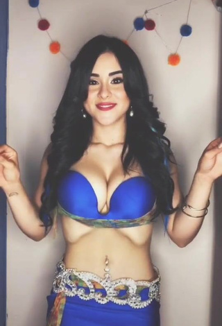 Cute Ónice Flores Shows Cleavage in Blue Bra while doing Belly Dance