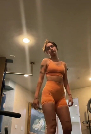 3. Erotic Rhegan Coursey in Orange Sport Bra