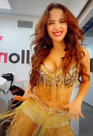 1. Irresistible Rosángela Espinoza Shows Cleavage in Golden Bra