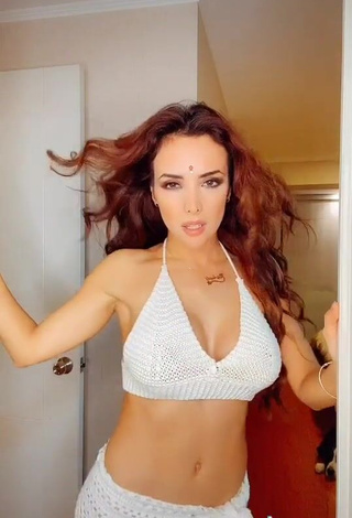 Pretty Rosángela Espinoza Shows Cleavage in White Crop Top