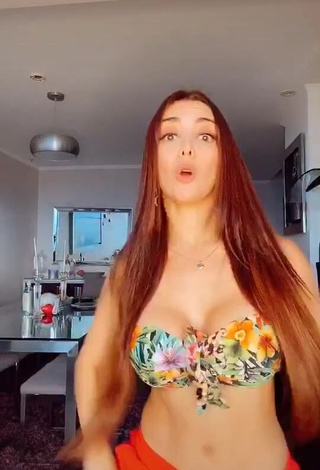 1. Cute Rosángela Espinoza Shows Cleavage in Floral Bikini Top