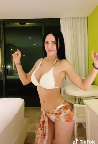 2. Sensual Rosángela Espinoza Shows Cleavage in White Bikini