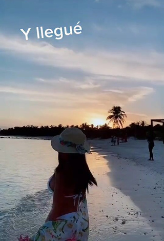 1. Adorable Rosángela Espinoza Shows Cleavage in Seductive White Bikini at the Beach