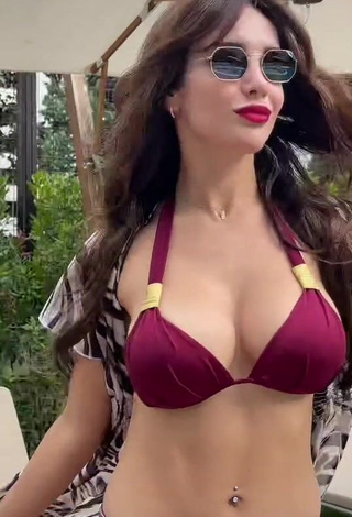 1. Erotic Rosángela Espinoza Shows Cleavage in Red Bikini at the Swimming Pool