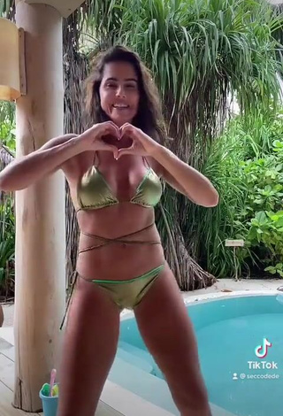 3. Irresistible Deborah Secco Shows Cleavage in Green Bikini at the Pool