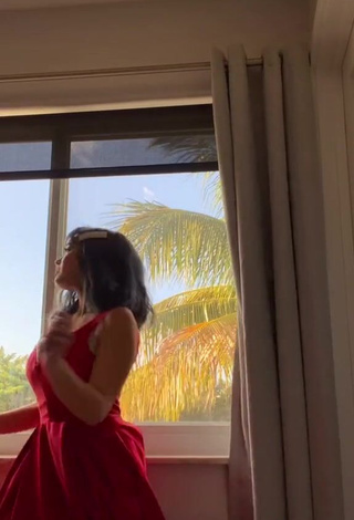 3. Cute Sofia Gomez Shows Cleavage in Red Dress