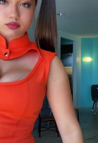 3. Captivating Sofia Gomez Shows Cleavage in Orange Dress and Bouncing Breasts