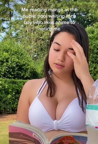 1. Cute Sofia Gomez Shows Cleavage in White Bikini Top