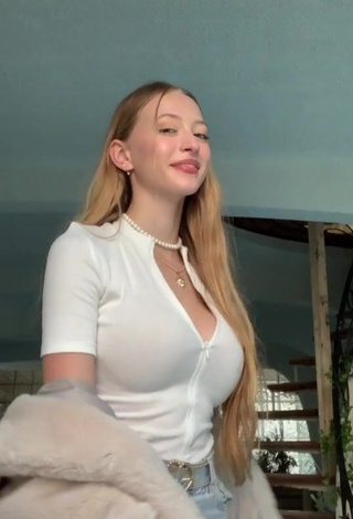 1. Captivating Sophia Diamond in White Top