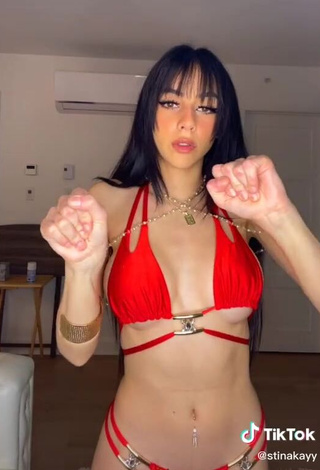 Erotic Christina Kalamvokis Shows Cleavage in Red Bikini (Underboob)