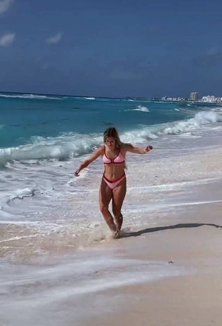 1. Captivating Tatum Beck in Pink Bikini at the Beach