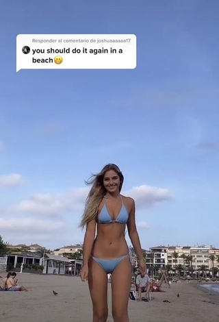 Cute Teressa Dillon Shows Cleavage in Blue Bikini at the Beach