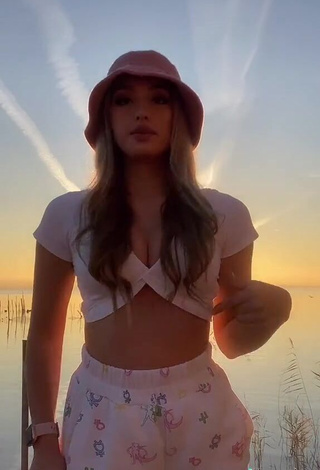 Cute Teressa Dillon Shows Cleavage in White Crop Top at the Beach