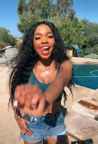 Hottie Teala Dunn in Turquoise Crop Top at the Swimming Pool