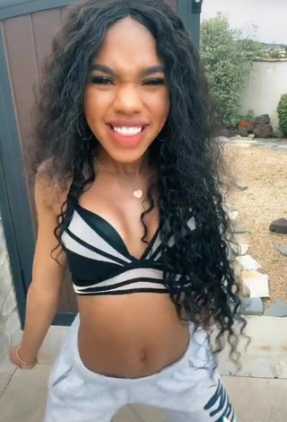 3. Captivating Teala Dunn Shows Cleavage in Sport Bra