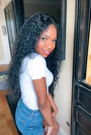 Captivating Teala Dunn Shows Cleavage in White Top