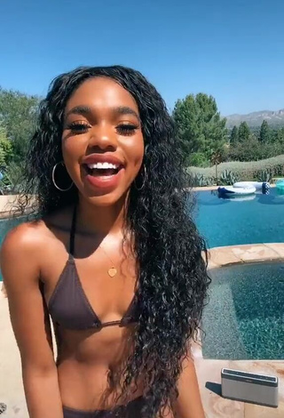 Teala Dunn in Erotic Black Bikini at the Swimming Pool