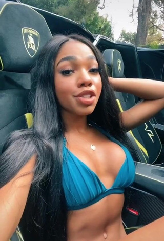 1. Irresistible Teala Dunn Shows Cleavage in Blue Bikini Top in a Car