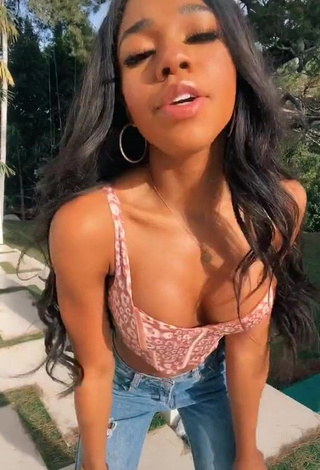 1. Erotic Teala Dunn Shows Cleavage in Leopard Crop Top