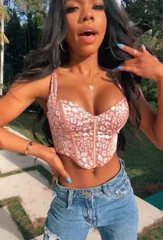 2. Erotic Teala Dunn Shows Cleavage in Leopard Crop Top