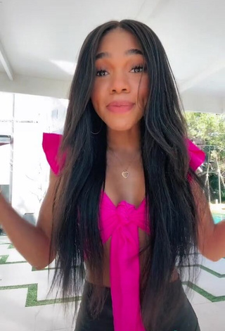 Hot Teala Dunn Shows Cleavage in Firefly Rose Crop Top