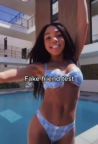 1. Irresistible Teala Dunn Shows Cleavage in Floral Bikini at the Swimming Pool