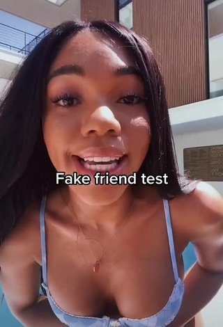 3. Irresistible Teala Dunn Shows Cleavage in Floral Bikini at the Swimming Pool