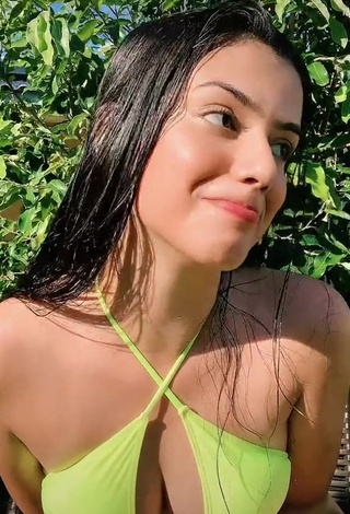 3. Elegant Victtoria Medeiros Shows Cleavage in Yellow Bikini Top