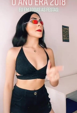 Irresistible Vivi Shows Cleavage in Black Crop Top