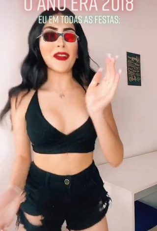 3. Irresistible Vivi Shows Cleavage in Black Crop Top