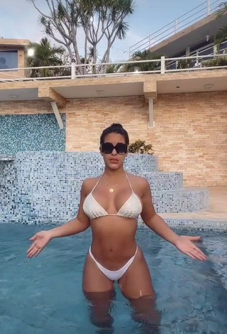 Captivating Yeimmy Shows Cleavage in White Bikini at the Pool