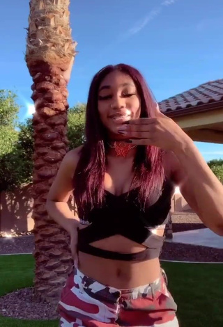 Irresistible Bria Alana Shows Cleavage in Black Sport Bra